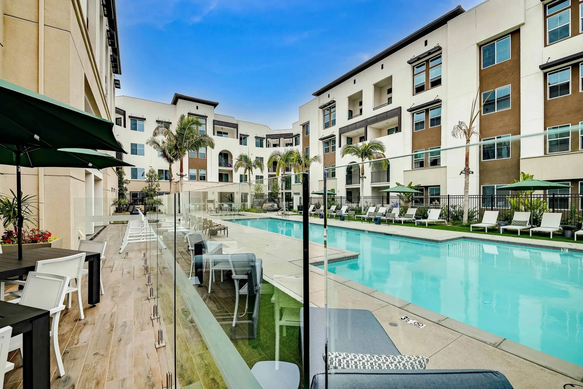 Enclave Town Centre pool deck surrounded by apartments
